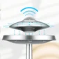 A silver, UFO-shaped electronic device showing arrows for air circulation and wireless connectivity symbols above it.