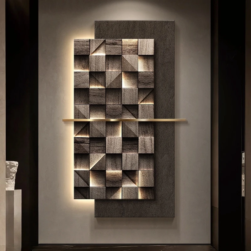 A geometric wall art piece with textured, illuminated square and rectangular patterns, featuring subtle lighting and a modern, minimalist design.